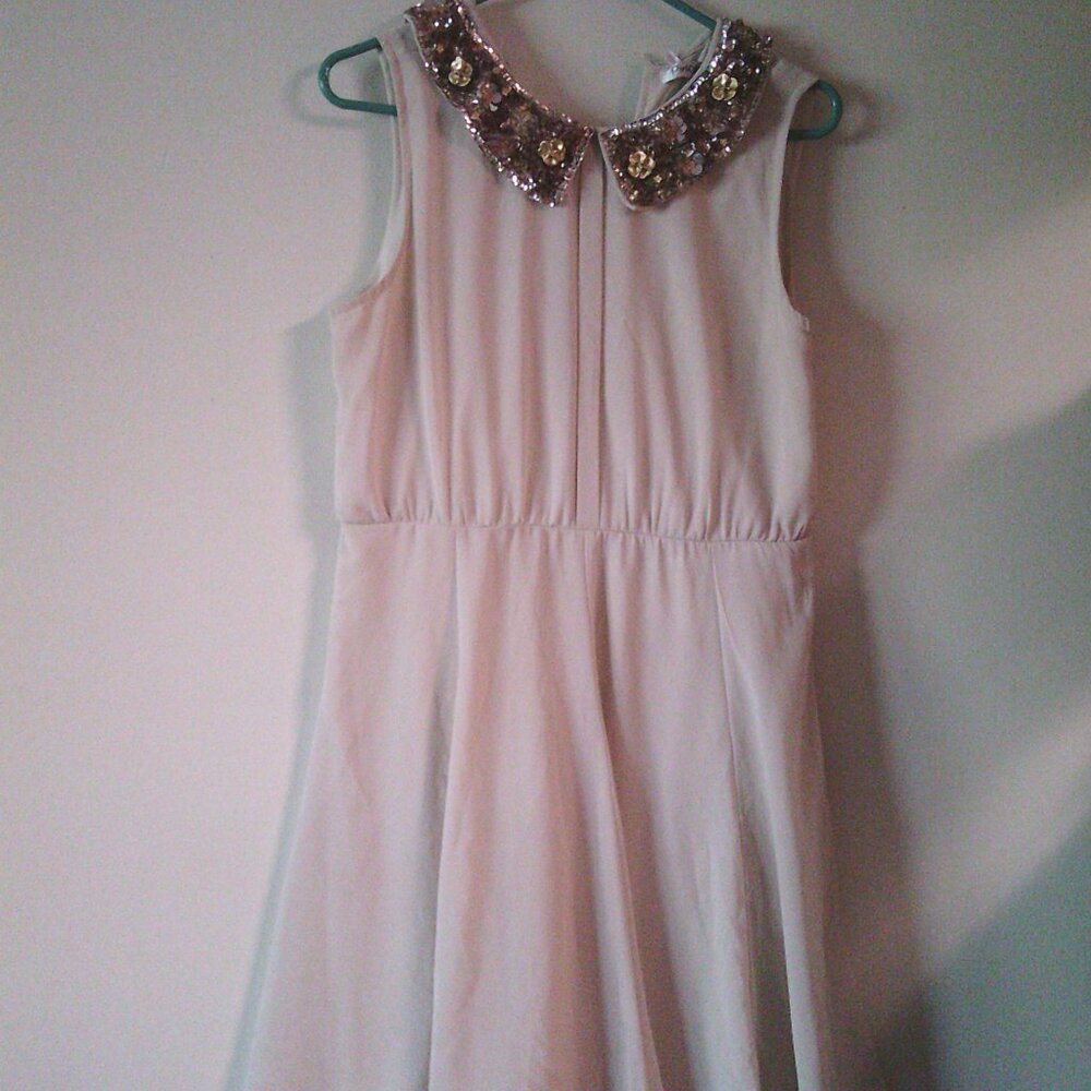 A shear dress with a suit jacket